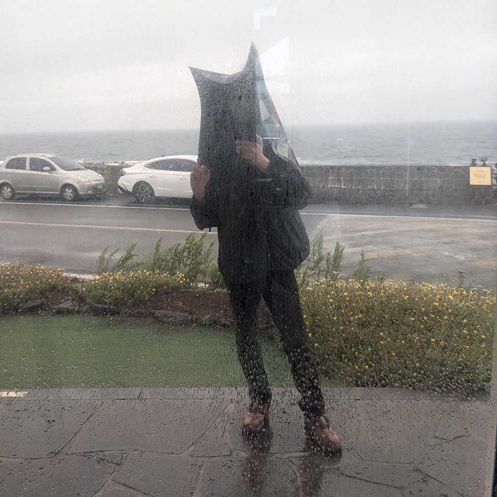 Walking Jeju Island in the rain